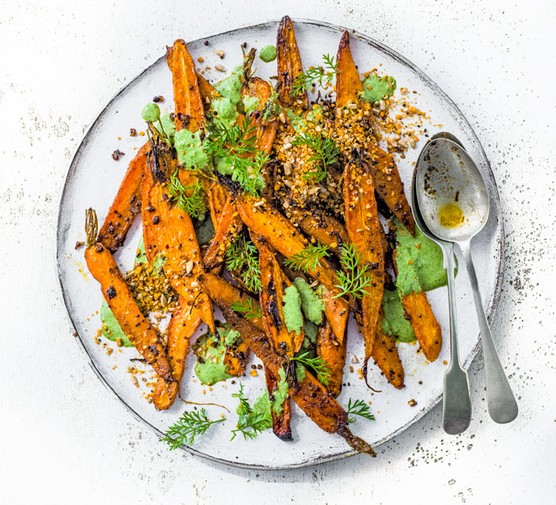 Roast Carrots with carrot tops on a plate