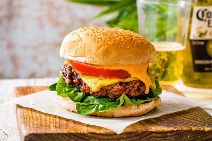 Burger next to a corona