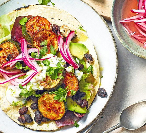 Healthy summer recipes Taco Topped with Sliced Charred Courgette, Black Beans and Red Onion