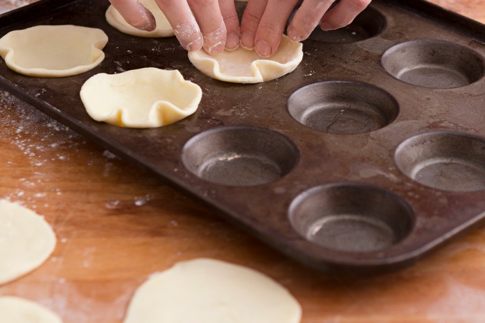 Press pastry into the tin