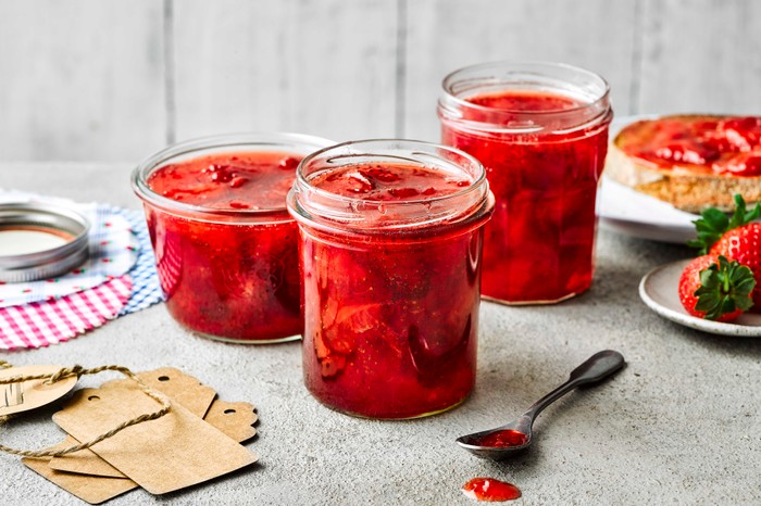 Three jars of strawberry jam