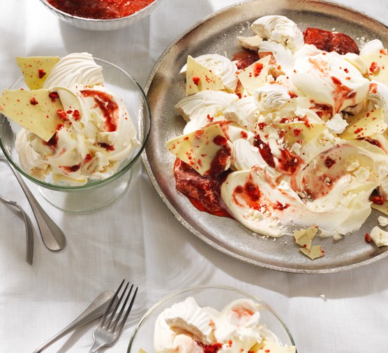 A big bowl of strawberry eton mess with white chocolate shards