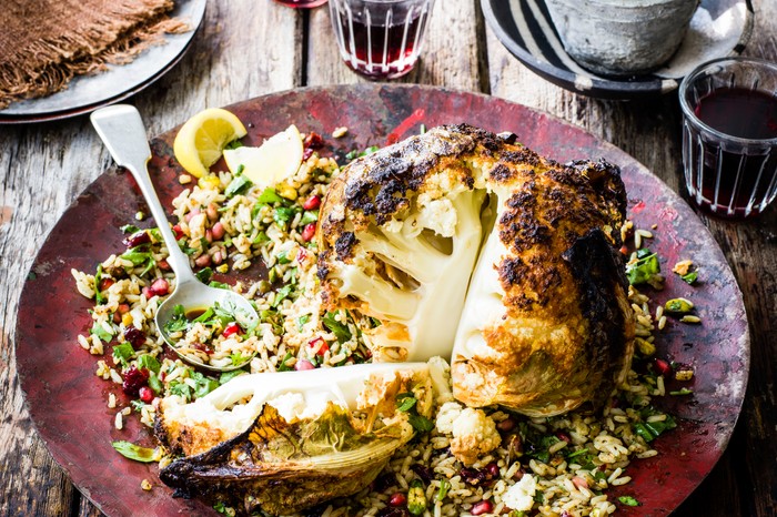 Whole tandoori cauliflower with jewelled rice salad