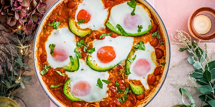 Tex-Mex Baked Avocado and Eggs in a White Casserole Dish