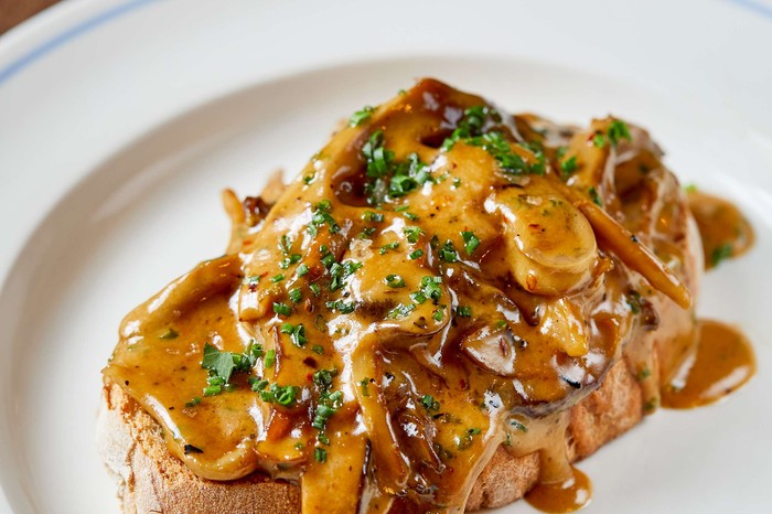 Mushrooms on toast, with herbs sprinkled on top