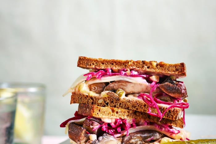 A reuben sandwich stacked high