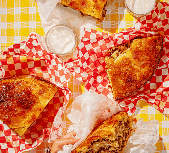 Burek on red and white checkerboard paper