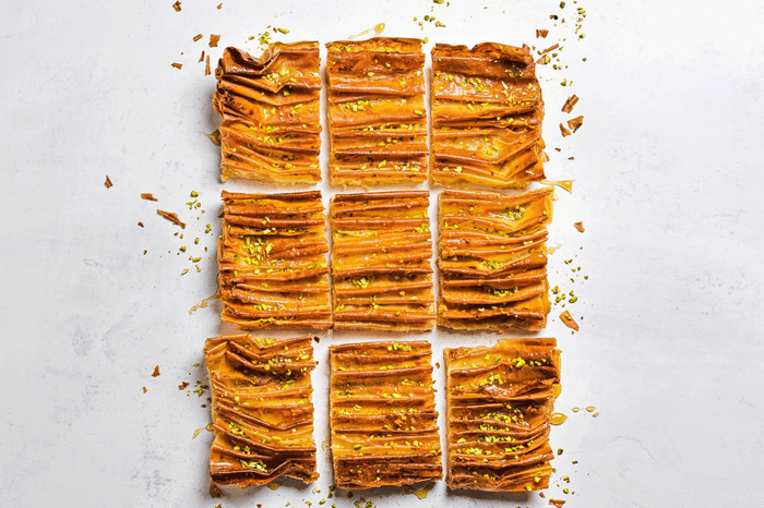 Rectangular crinkle-topped filo tart on a white background