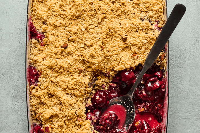 Cherry and almond crumble in a baking dish