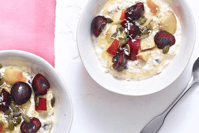 Overnight bircher muesli with cherries, peach and coconut