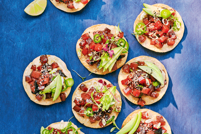 Tuna tostadas with avocados, jalapeños and black and white sesame seeds