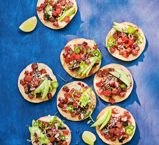 Tuna tostadas with avocados, jalapeños and black and white sesame seeds